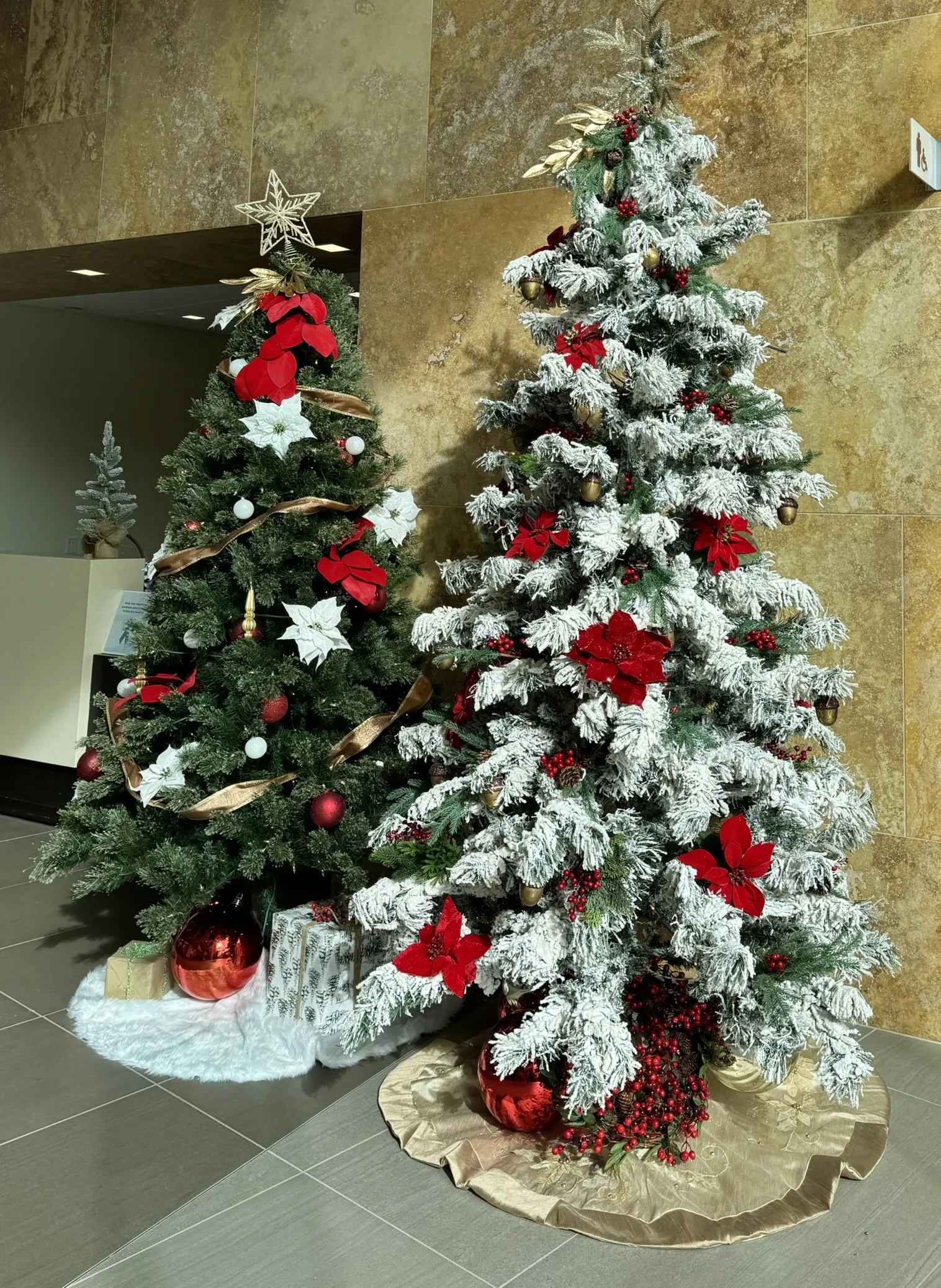 Decorated holiday trees in a lobby